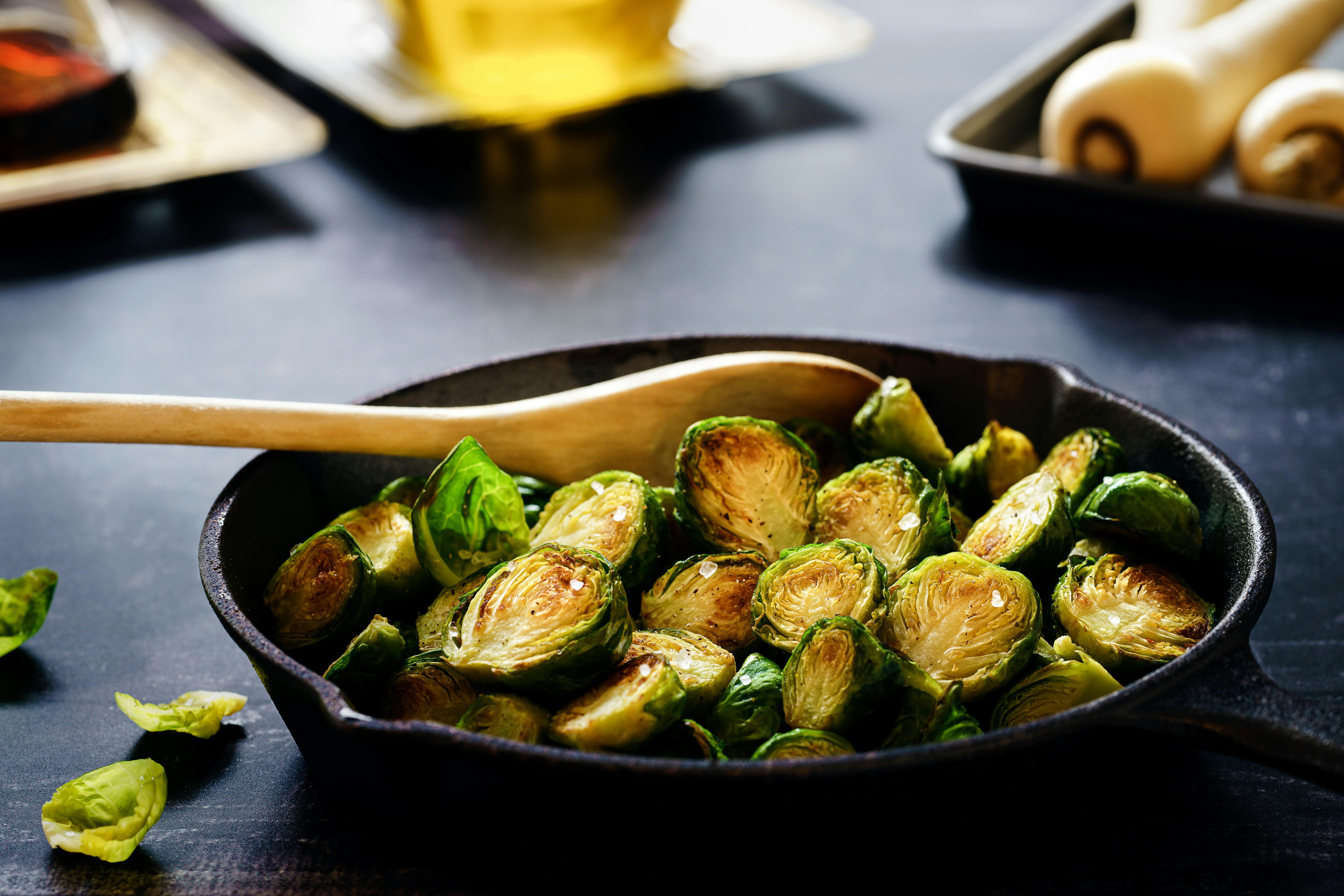 Pan with grilled brussels sprouts by Sebastian Coman Photography on Unsplash